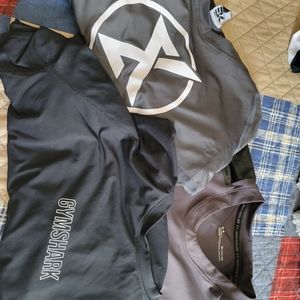 3 pre owned  workout shirts